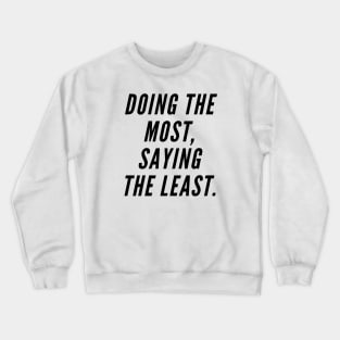 Doing the most, saying the least. Crewneck Sweatshirt